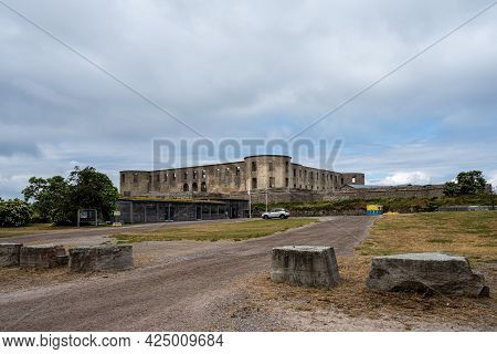 An Old Castle With A Dramatic Sky In The Background. Borgholm Castle Ruins On The Baltic Sea Island 