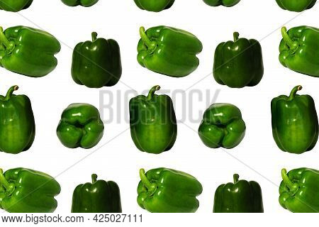 Green Peppers In An Abstract Pattern On White