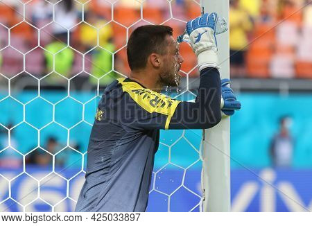Bucharest, Romania - June 21, 2021: Goalkeeper Georgiy Bushchan Of Ukraine Pours Water During The Ue