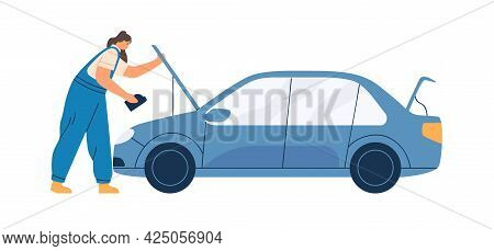 Female Mechanic In Overalls Repairing Car. Woman Working In Auto Service, Standing With Oil Canister