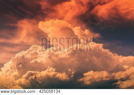 Big Cummulus White Cloud On Blue Sky, Colored Photo