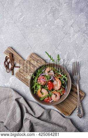 Healthy Salad With Fresh Arugula, Cherry Tomatoes, Tasty Shrimps And Onion