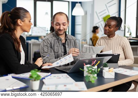 Team Of Diverse Startup Company Colleague Entrepreneur Meeting In Professional Workplace, Brifing An