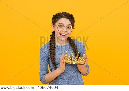 Cute Adorable Girl In Glasses. Princess Concept. Happy Smiling Princess. Excellent Pupil. Success An