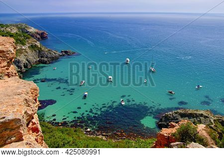 Bounty Beach At Cape Fiolent In The Crimea. Sea Lagoon With Boats And Yachts On A Sunny Summer Day.