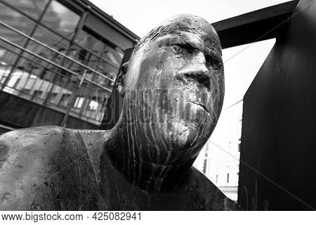 Germany, Luebeck, June 19, 2017, Bronze Statue With The Name, Revolving Door, In The Pedestrian Zone
