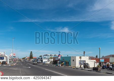 Gansbaai, South Africa - April 12, 2021: Street Scene, With Businesses And Vehicles, In Gansbaai In 