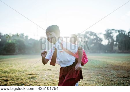 Little Girl Student Running Together While Going To Their School
