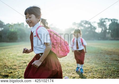Little Girl Student Running Together While Going To Their School