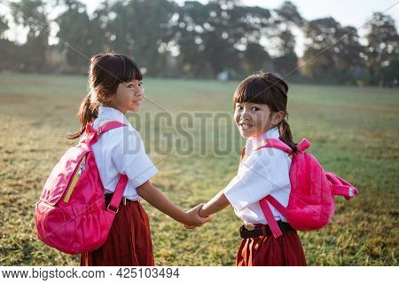 Two Girl Friend Primary School Student Walking Together