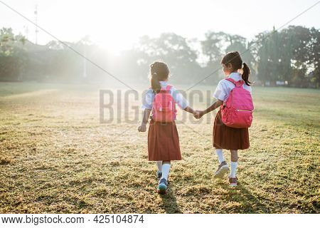 Primary School Student Friend Wearing Indonesian Uniform Going To School