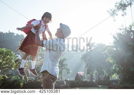 Proud Dad Raise Her Daughter Up To The Sky
