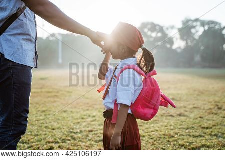 Primary School Student Kiss Her Father Hand When Going To School