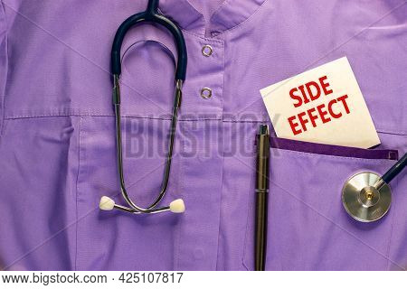 Covid-19 Side Effect Symbol. Medical Uniform, White Card With Words Side Effect, Metalic Pen And Ste