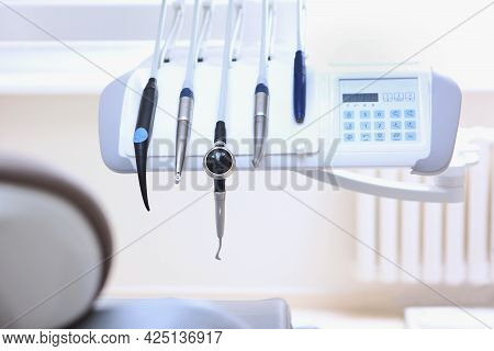 Dental Equipment In The Doctors Office. Tool Holder. Dental Handpieces. Movable Console With Tools. 