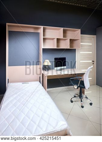 Bedroom Interior With Yellow Unfolded Vertical Mount Murphy Wall Bed, Pull Out Bed Stored Into Worki