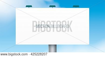 Billboard Standing On A Blue Sky Background.