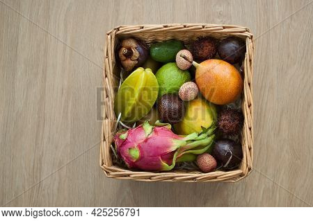 Big Basket Of Fresh Tropical Fruits, Passion Fruit, Carambola, Dragon Fruit Or Pitaya, Mangosteen, L