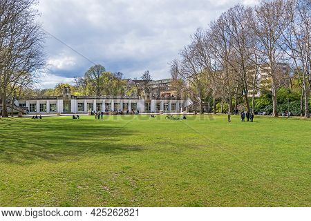 Berlin, Germany - April 25, 2021: Playgrounds Of The Garden Monument Rudolph Wilde Park And The Arch