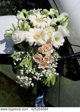 Wedding Decoration On Car Side Mirror In Pastel Colours Made From Pink Roses, White Daisies, Close U