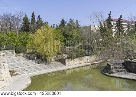Sudak, Crimea - April 28, 2021: A Pond In The Park Of The Tourist And Recreation Center 