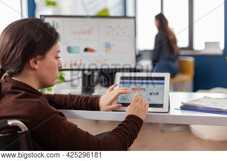  Paralysed Handicapped Woman Entrepreneur Using Computer And Tablet In Same Time Checking Sta
