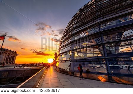 Berlin, Germany - 19 September 2020: Glass dome of Reichstag at sunset