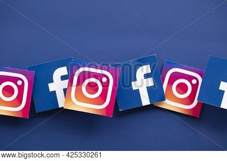 London, Uk - June 2021: Facebook And Instagrm Logos Printed Onto Paper