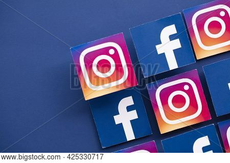 London, Uk - June 2021: Facebook And Instagrm Logos Printed Onto Paper