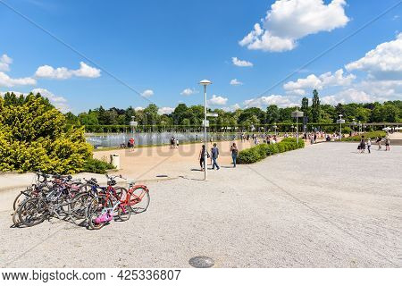 Worclaw, Poland - June 6, 2021: Tourists Watch The Show At Pergola - Wroclaw Multimedia Fountain