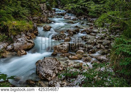 Magic Forest Zauberwald At Lake Hintersee With Creek Ramsauer Ache. National Park Berchtesgadener La
