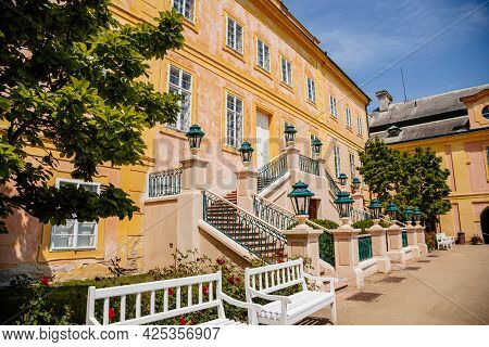 Krasny Dvur Chateau, North Bohemia, Czech Republic, 19 June 2021: Baroque Yellow Castle With Stairs,