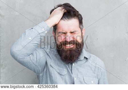 Aches And Pains. Headache And Overworking. Negative Emotions. Feel Bad. Bearded Man. Mature Hipster 