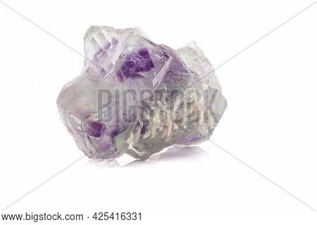 Macro Mineral Stone Fluorite Crystal On A Black Background Close-up