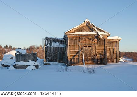 The Ruins Of An Ancient Wooden Church Of The Tikhvin Icon Of The Mother Of God Close Up On A Februar
