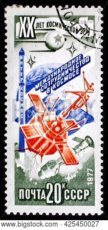 Russia, Ussr - Circa 1977: A Postage Stamp From Ussr Showing Interkosmos 20 Years Of The Space Age