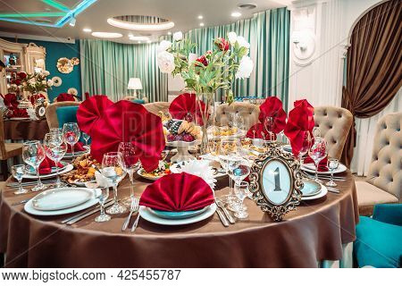 A Table Set In A Restaurant On A Holiday.