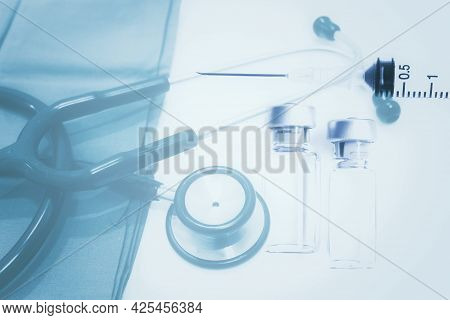 Vial Of Drugs Or Vaccine, 3 Ml Plastic Syringe With Needle And Stethoscope