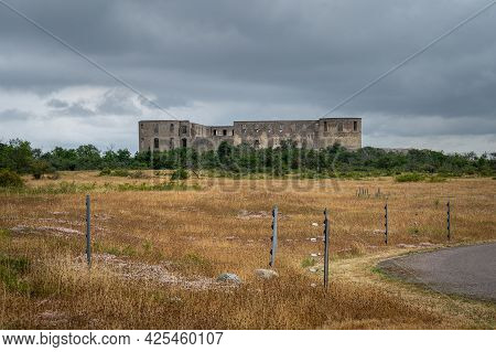 An Old Castle With A Dramatic Sky In The Background. Borgholm Castle Ruins On The Baltic Sea Island 