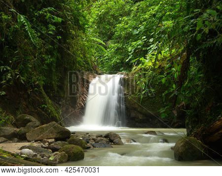 Slow Motion Of Waterfall And River In Forest Podocarpus National Park, Ecuador.
