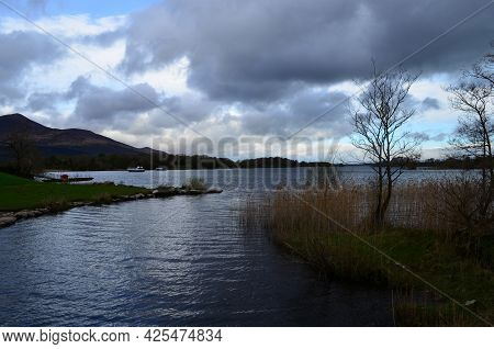 Gray Storm Clouds Gathering Over A Lake In Killarney Naitonal Park Ireland.
