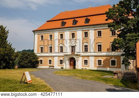 Valec, Western Bohemia, Czech Republic, 19 June 2021: Baroque Castle Front Yard With Green Lawn At S