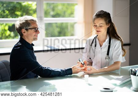 Diabetes Blood Sugar Check For Man By Doctor