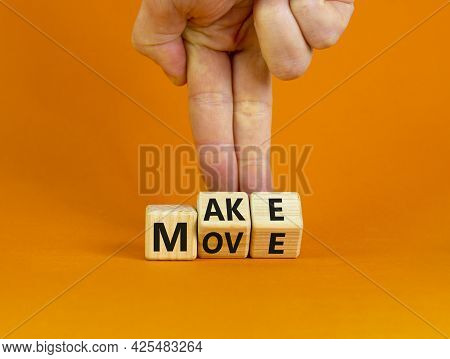 Make Your Move Symbol. Businessman Turns Wooden Cubes With Words 'make Move'. Beautiful Orange Backg