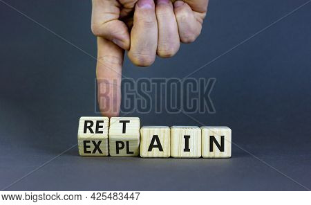 Retain Or Explain Symbol. Businessman Turns Wooden Cubes And Changes The Word Explain To Retain. Bea