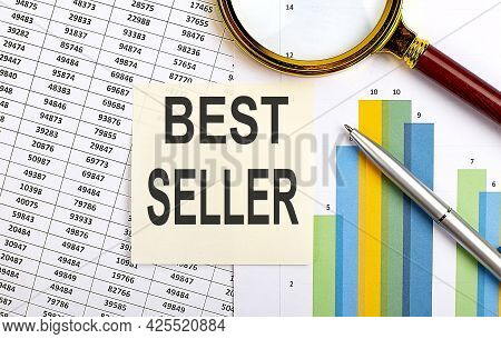 Business Concept. Top View Of Stiscker With Text Best Seller On The Chart Background