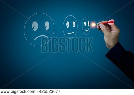Businessman Darts A Smiley Face Emoticon On Virtual Touch Screen. Customer Service Evaluation Concep