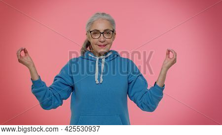 Keep Calm Down, Relax, Inner Balance. Mature Old Granny Woman Breathes Deeply With Mudra Gesture, Ey