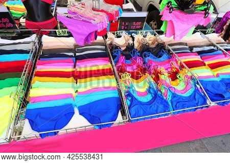 Underwear Stalls With Very Colorful Underwear And Tank Tops For Sale At Market