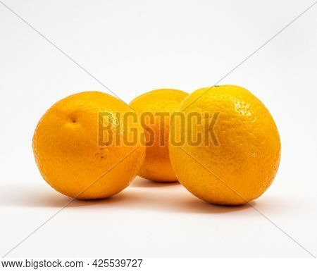 Oranges On A White Background. Isolated Oranges.